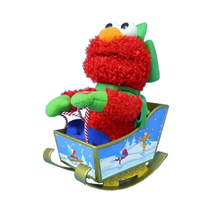 Sesame Street Kurt Adler SE7105 Singing Elmo Rocking Sleigh Animated Musical Tablepiece, Plays the Tune Deck the Halls, 10-Inch